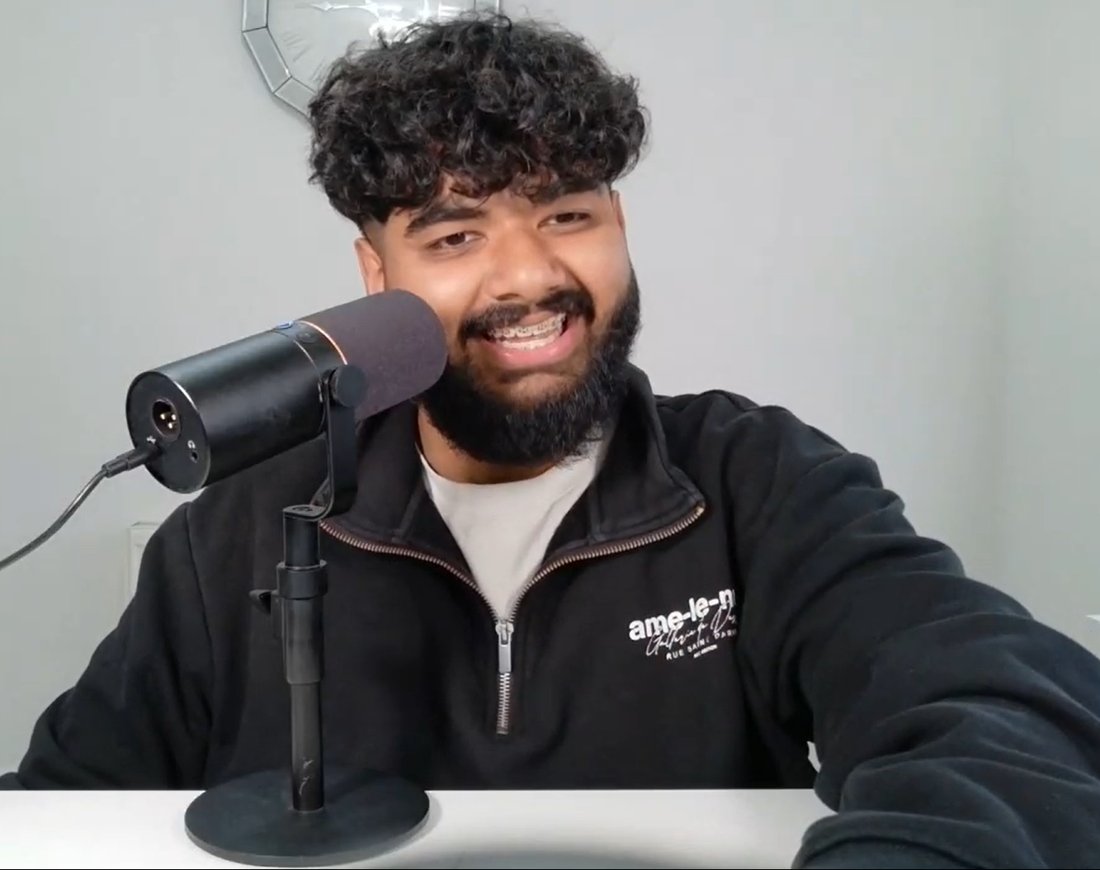 Albert Mathew, host of Founders Mindset Unfiltered, at the microphone